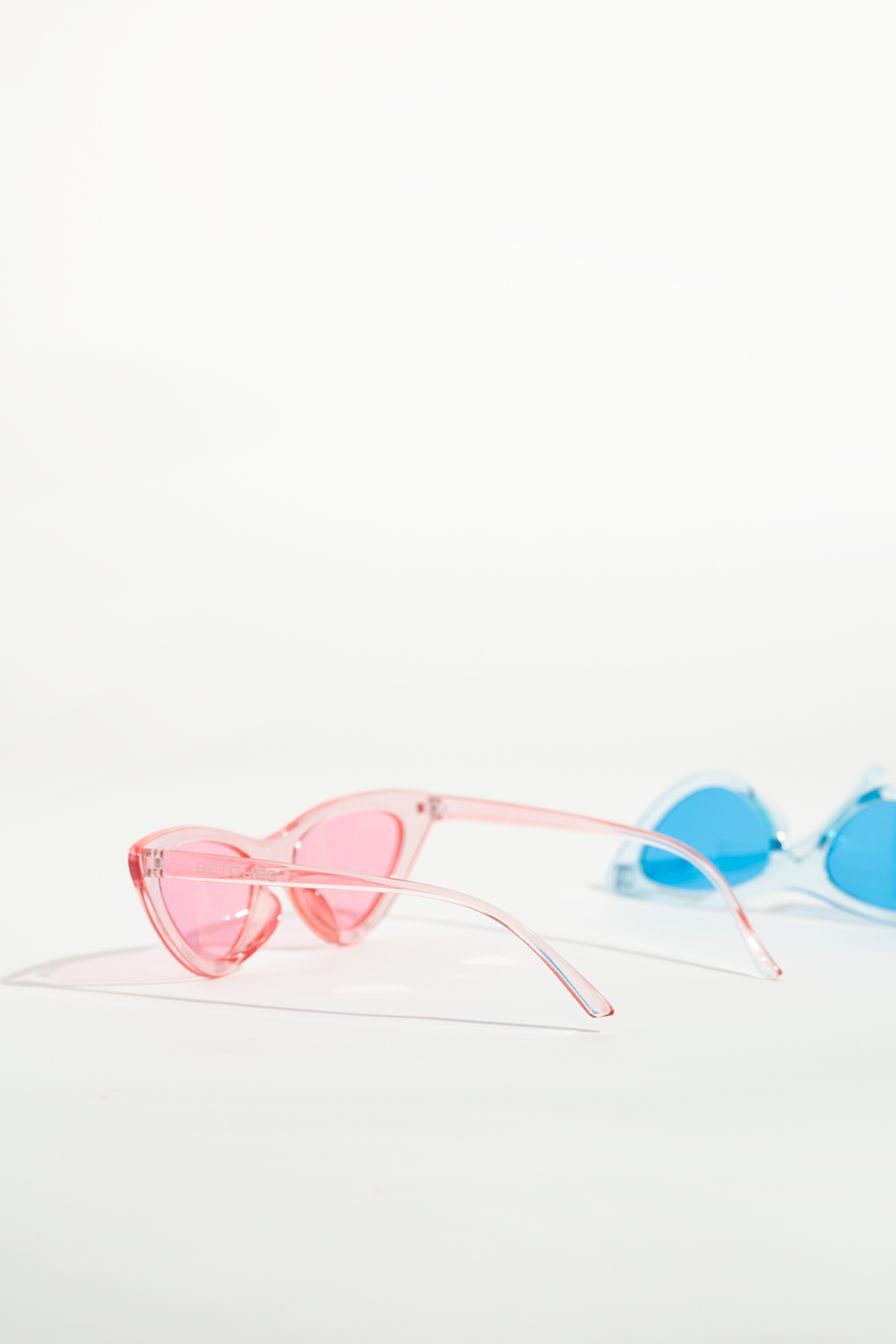 https://shop.betches.com/cdn/shop/products/CANDY-SUNGLASSES-SIDE-PINK-WEB_2048x2048.png?v=1661377126